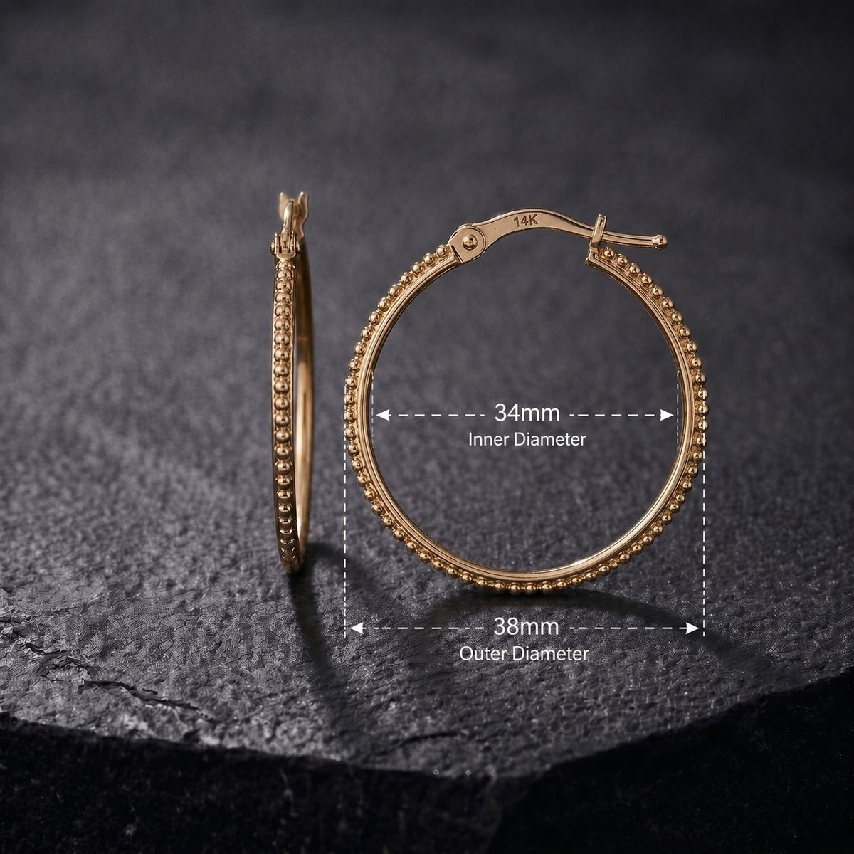 A pair of gold hoop earrings with measurements and text indicating the inner and outer diameter.