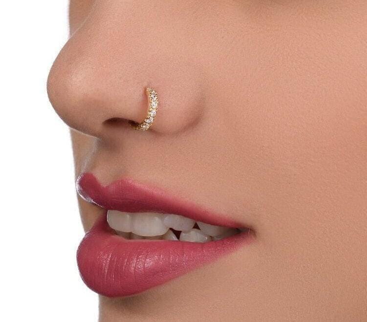 A close-up of a person's face, focusing on their lips and nose.