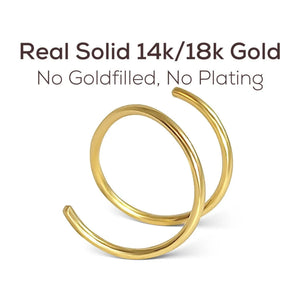 a pair of gold rings with a caption stating that they are real solid 14k/18k gold, without any goldfills or plating.