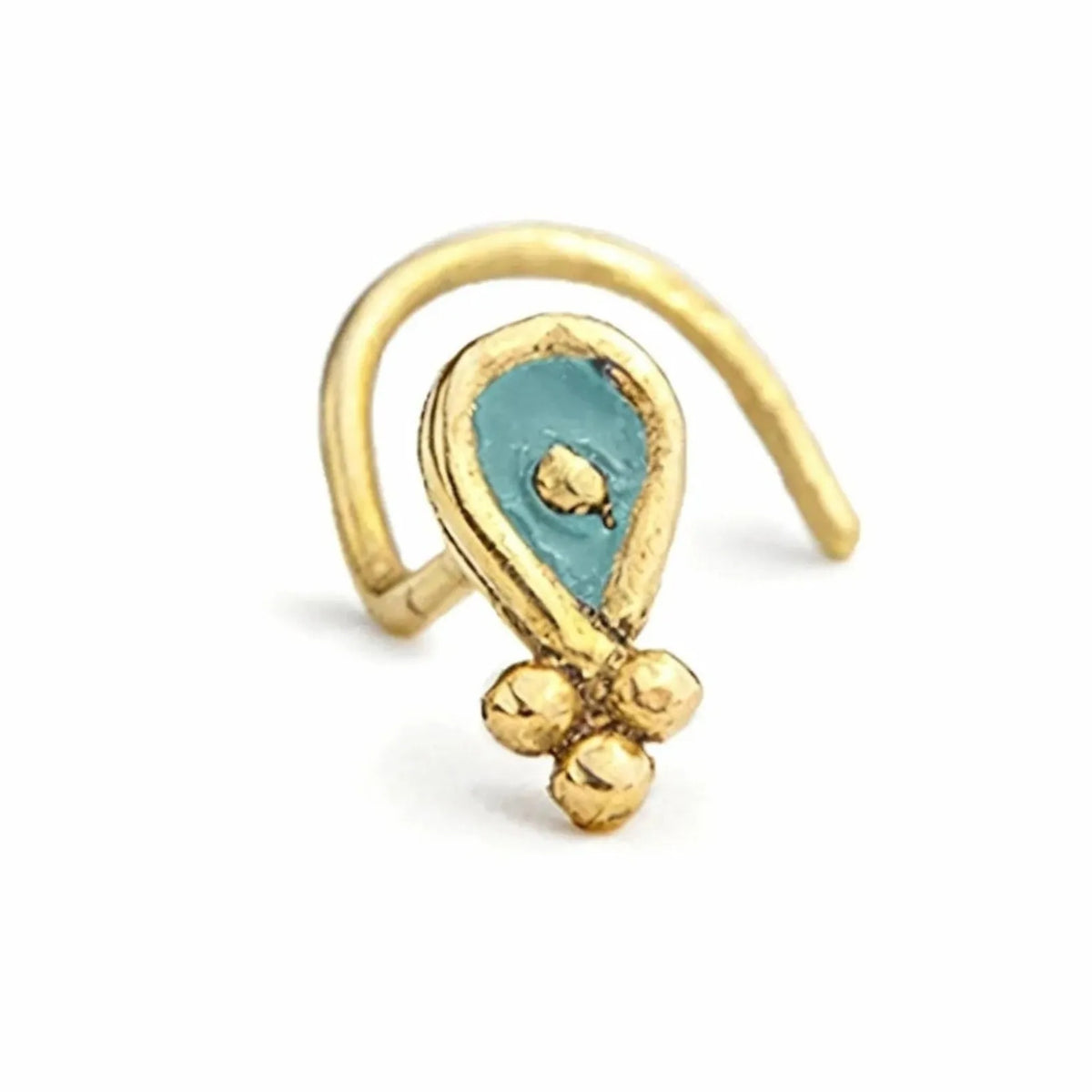 A gold-colored nose ring with a blue gemstone in the center.