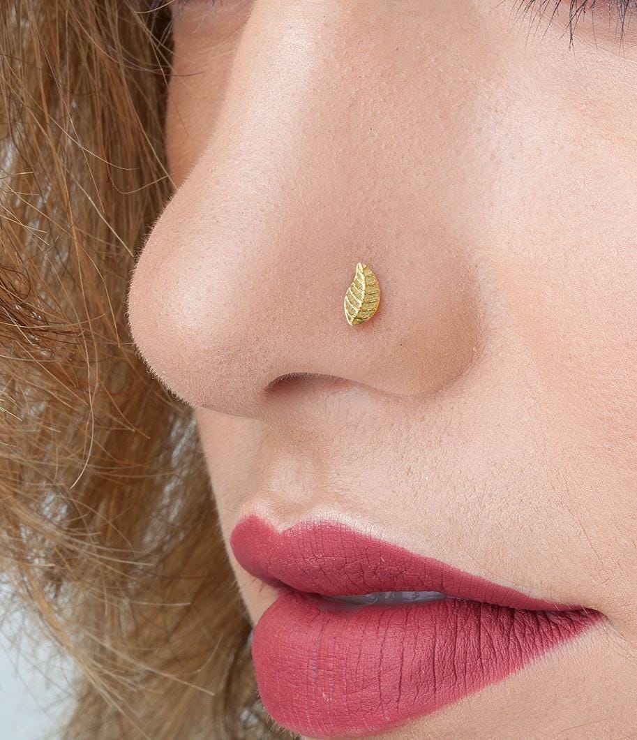 A close-up of a person's face, focusing on their nose and lips.