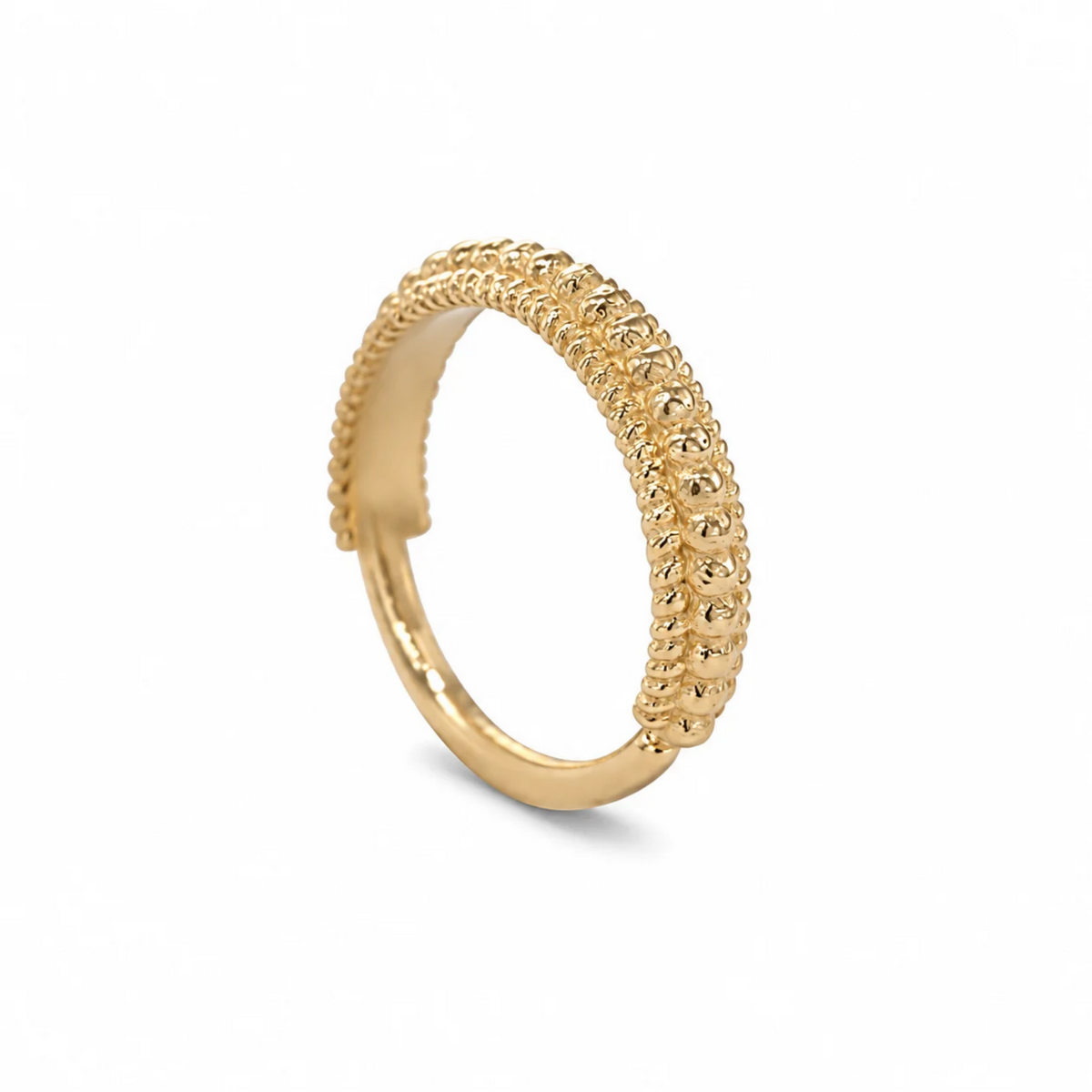 A gold ring with a textured, embossed design.