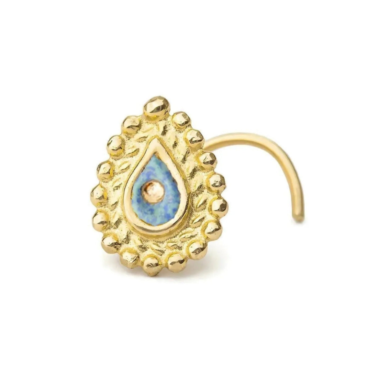 A gold-colored nose ring with a blue gemstone in the center, set against a white background.