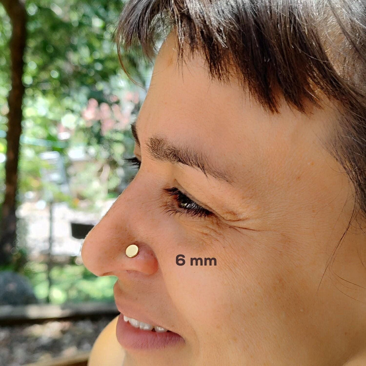 A close-up of a person's face, focusing on their nose and facial features.