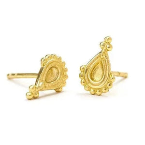 a pair of gold earrings with intricate designs, including a teardrop-shaped pendant and small round decorations.