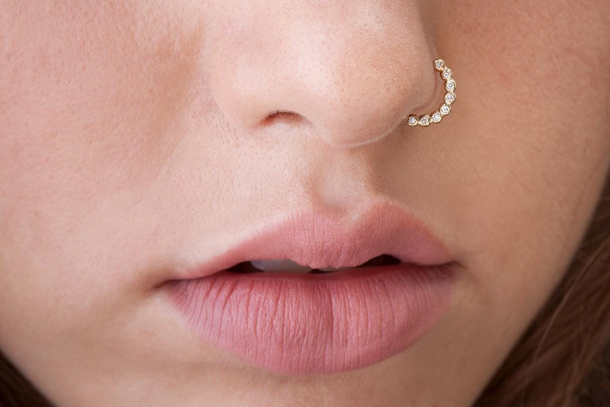 A close-up of a person's face, focusing on their lips and nose.