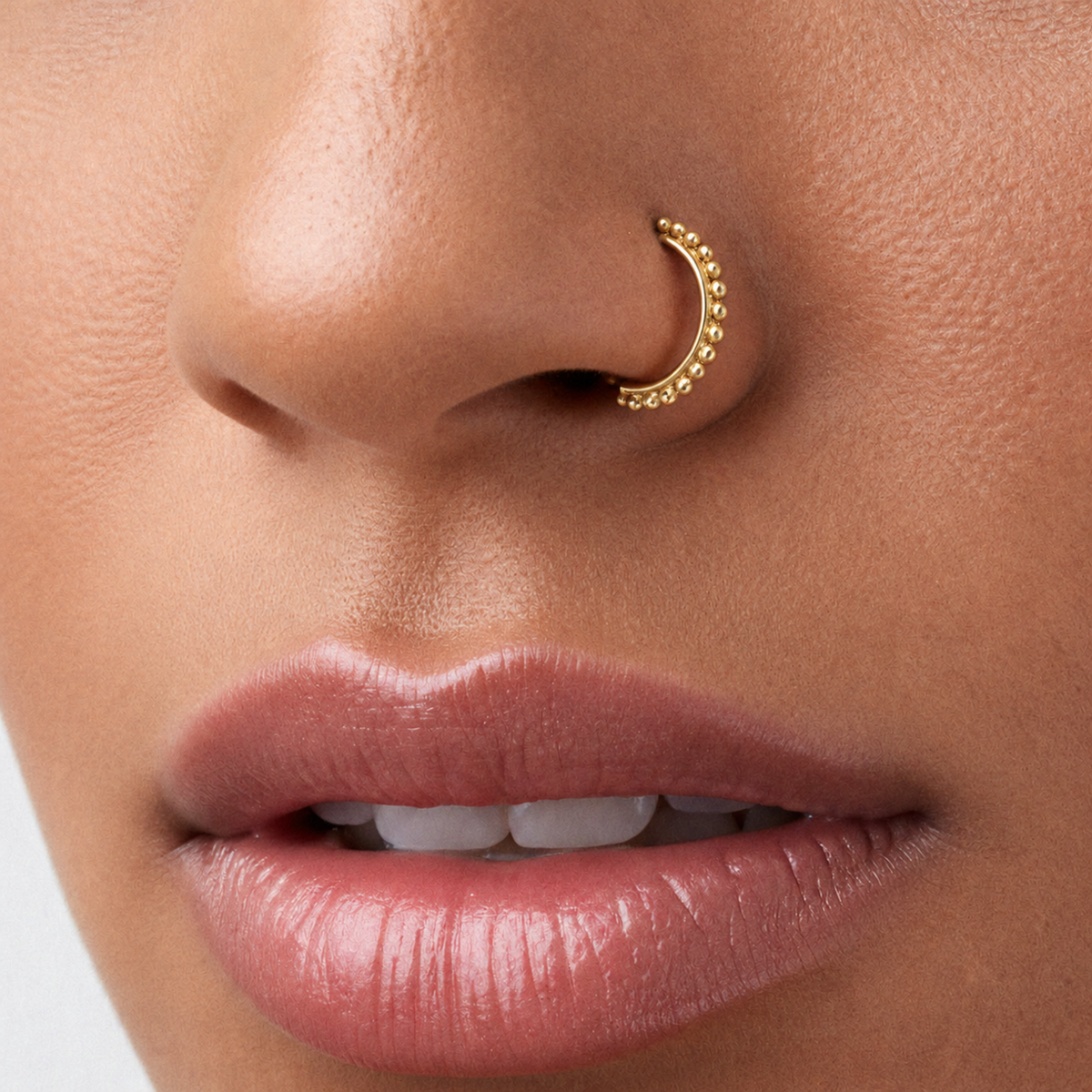A close-up of a person's face, focusing on their lips and nose.