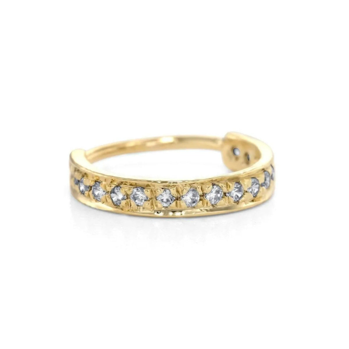 A gold ring with a row of small diamonds set in it.