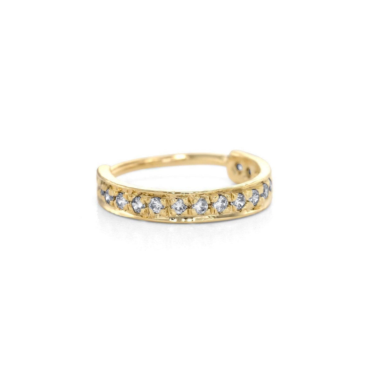 A gold ring with a row of small diamonds set in it.