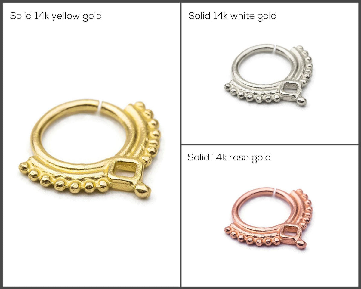 three different types of nose rings made of 14k gold, 14k white gold, and 14k rose gold, each with distinct designs and finishes.
