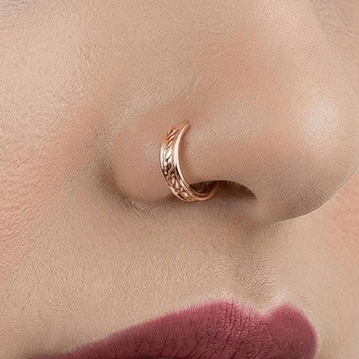 Dainty Nose Ring: A close-up of a person's face, focusing on their lips and nose.