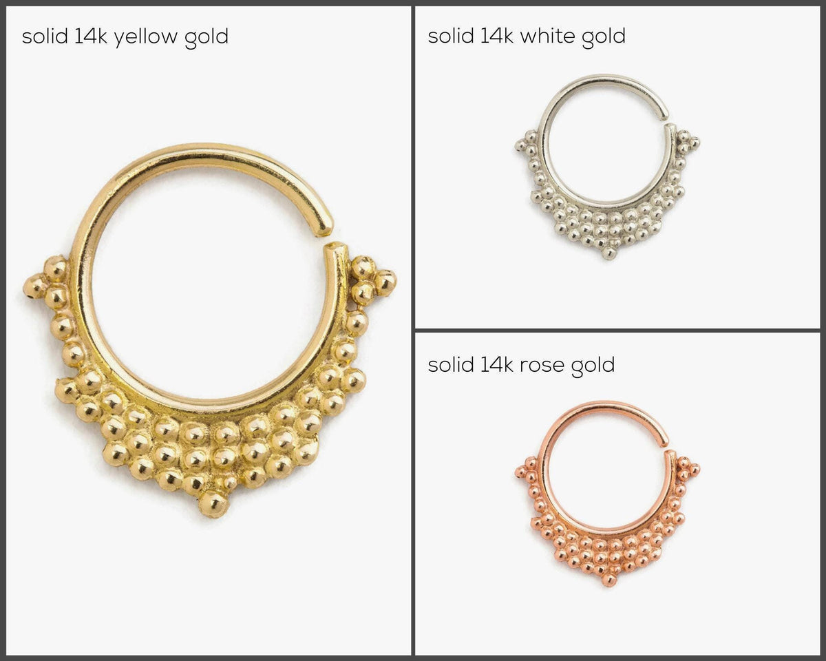three different types of 14k gold and 14k white gold nose rings, each with a unique design and color.