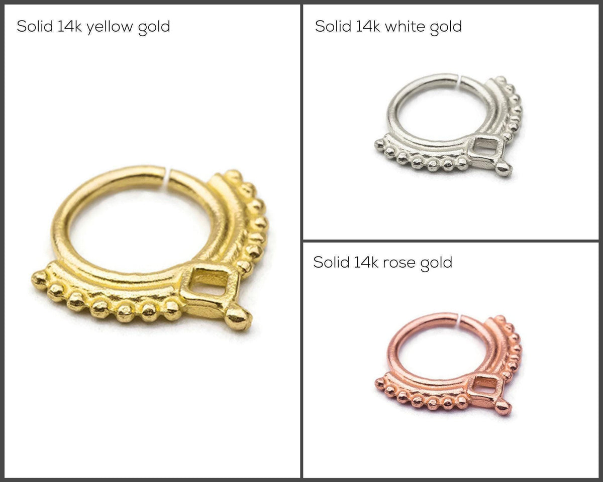 three different types of nose rings made of 14k gold, 14k white gold, and 14k rose gold, each with distinct designs and finishes.