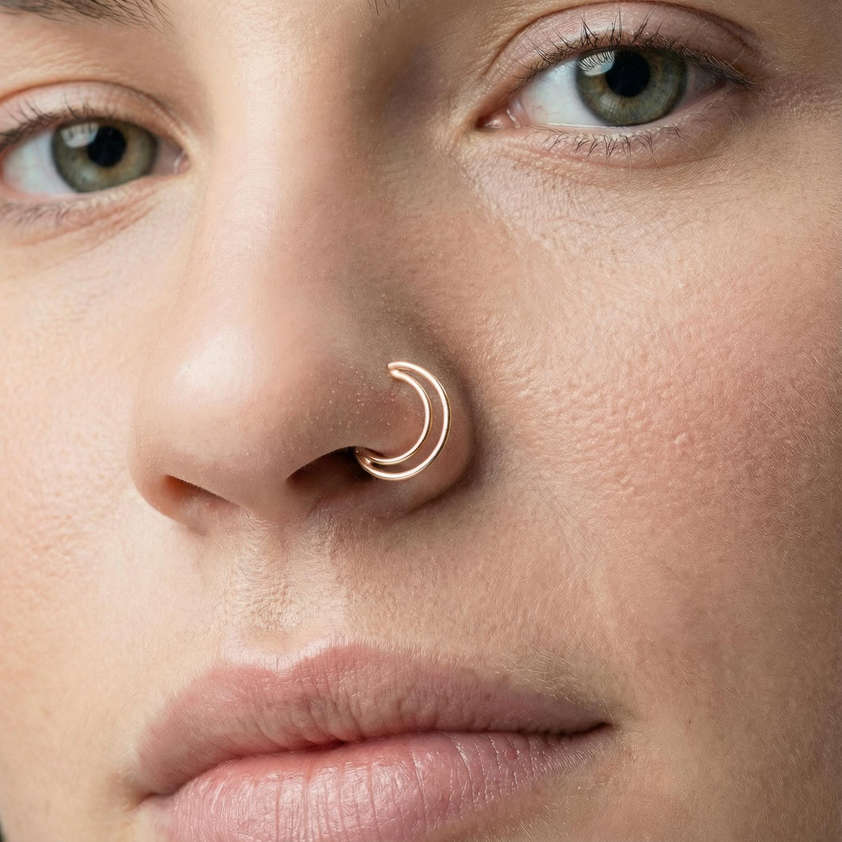 A close-up of a person's face, focusing on their nose and mouth area.
