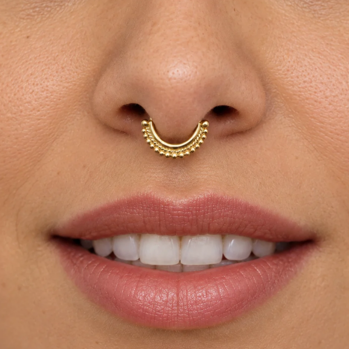 A close-up of a person's face, focusing on their lips and nose.
