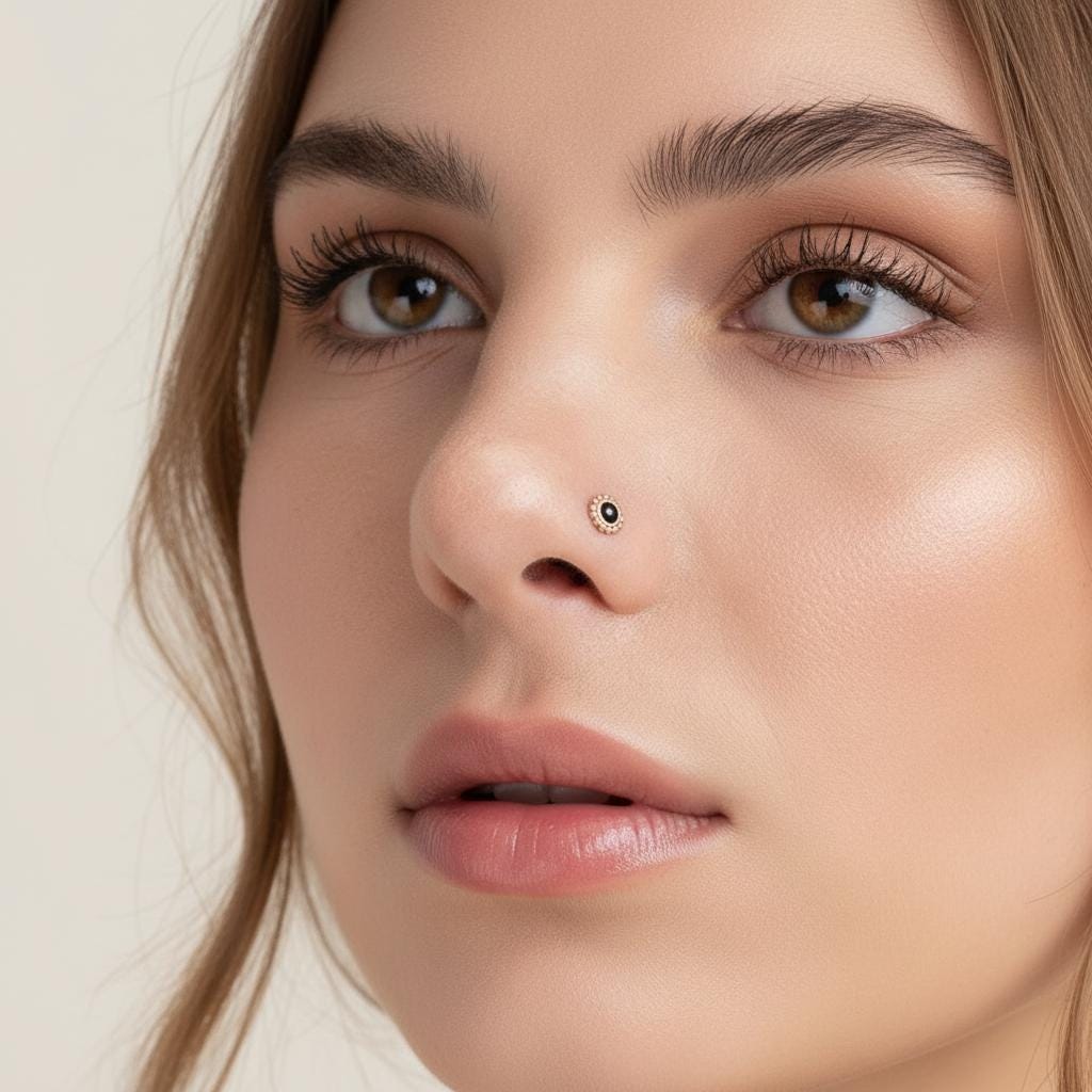 A close-up of a woman's face, focusing on her nose and lips.