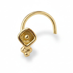 Small Indian Nose Pin: A gold-colored metal nose ring with a small, square-shaped charm attached to it.
