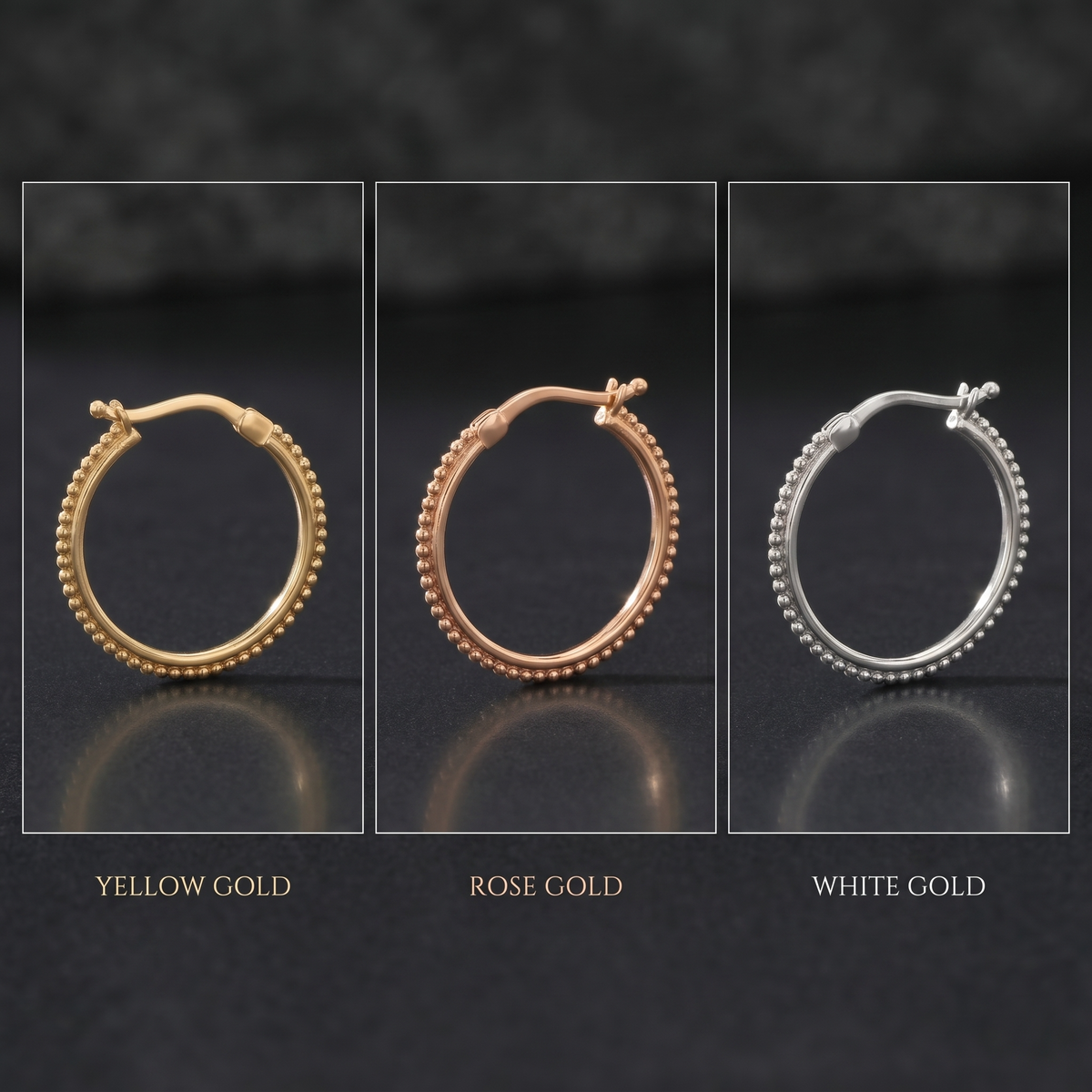 three different colored gold earrings, each with a unique design, arranged in a row against a dark background.