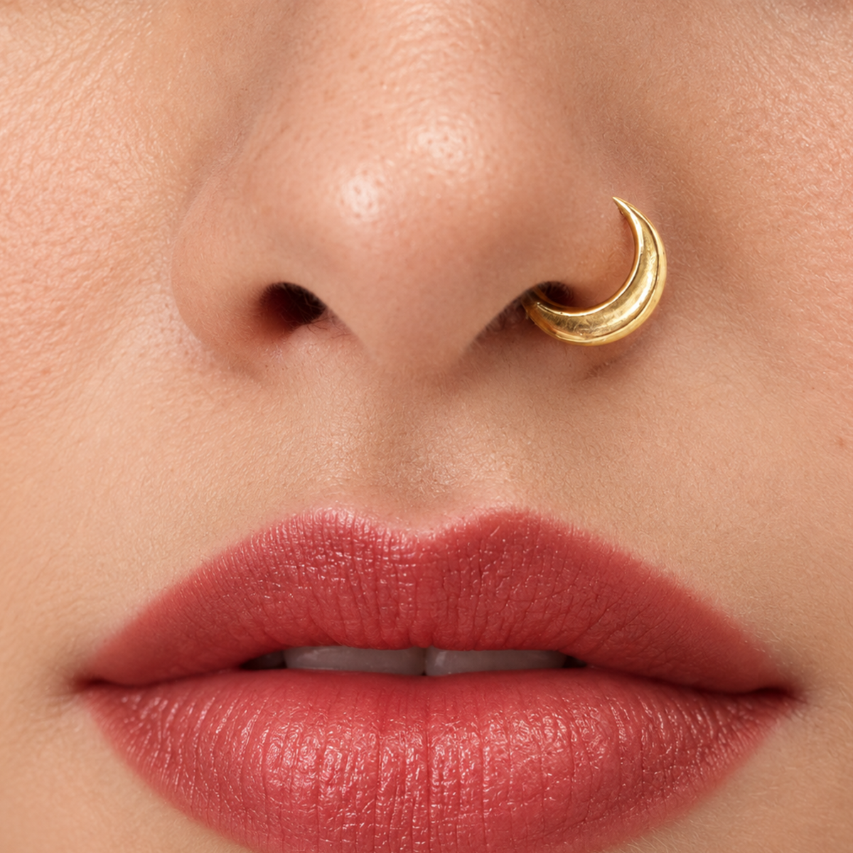 A close-up of a person's face, focusing on their lips and nose.