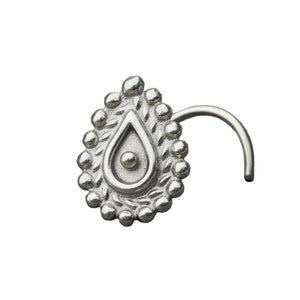 Indian Style Nose Stud: A silver nose ring with an ornate, teardrop-shaped design sits on a gray surface.