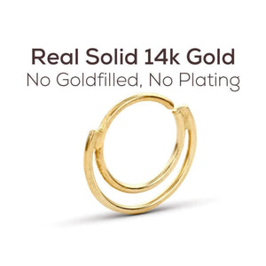 a gold-colored ring with a textured surface, and it is described as a "Real Solid 14k Gold" without any additional text.