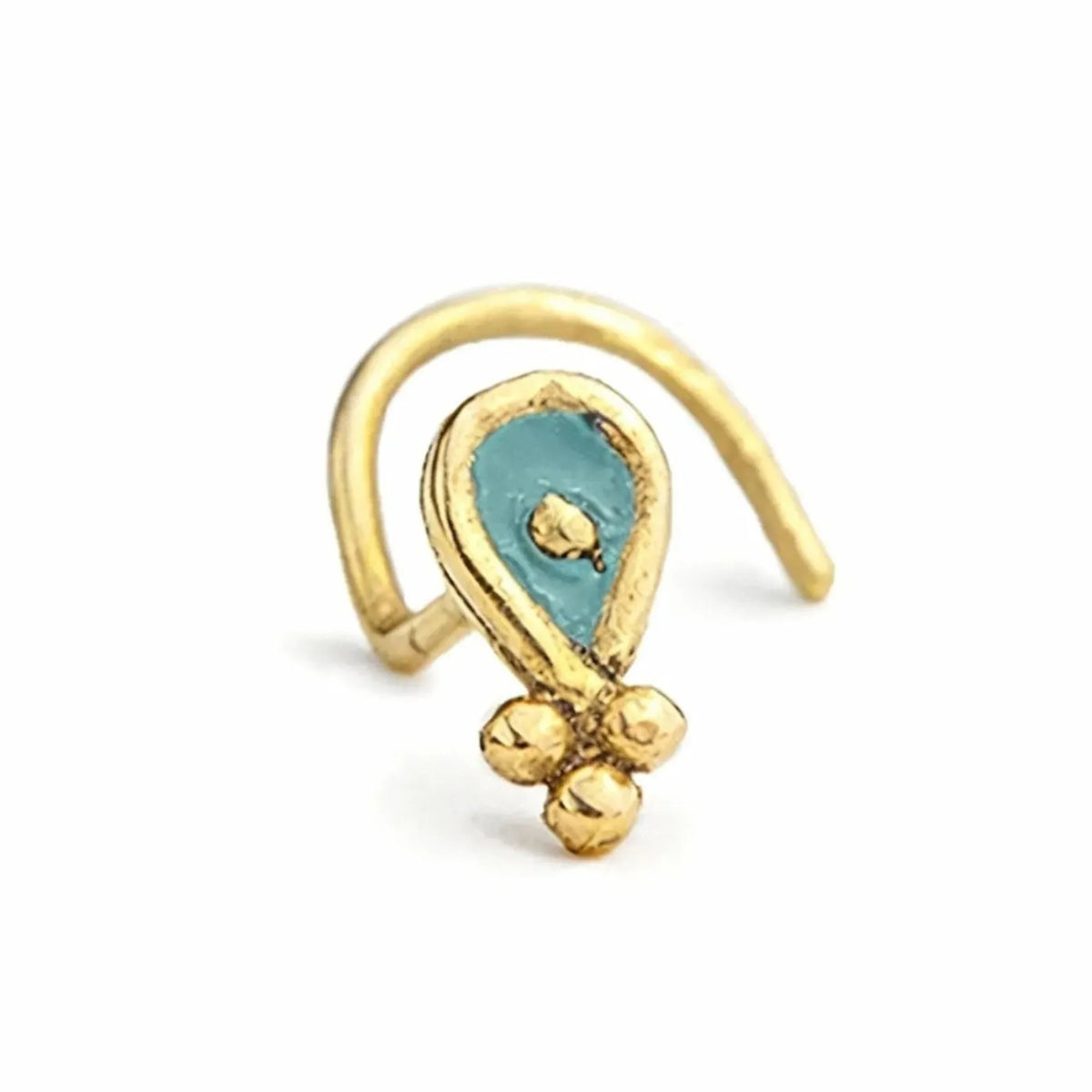 A gold-colored nose ring with a blue gemstone in the center.