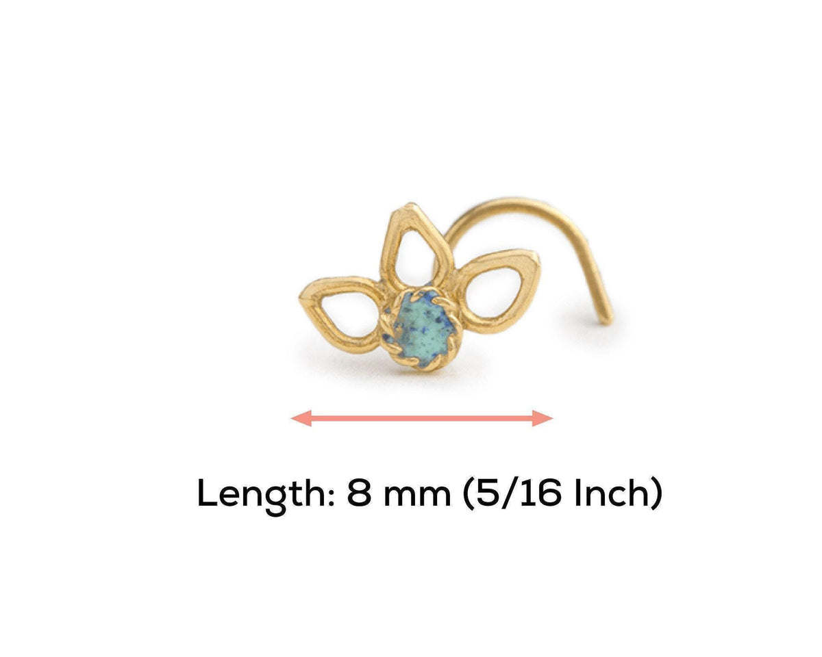 A gold-colored nose ring with a blue gemstone in the center, accompanied by a measurement indicating the length of the nose ring is 8 millimeters (5-16 inches).