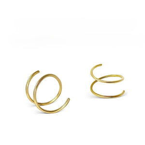 three gold-colored spiral earrings, each with a unique design.