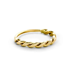 A gold ring with a twisted design.