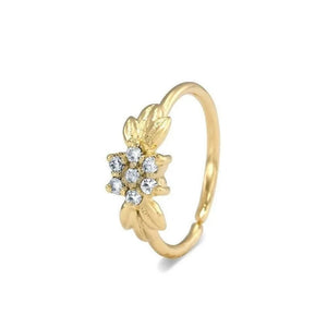Flower Diamond Nose Ring: A gold ring with a flower-shaped gemstone set in the center.