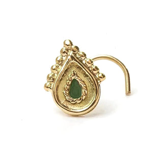 Nose Stud Jewelry: A gold-colored nose ring with a green gemstone in the center.