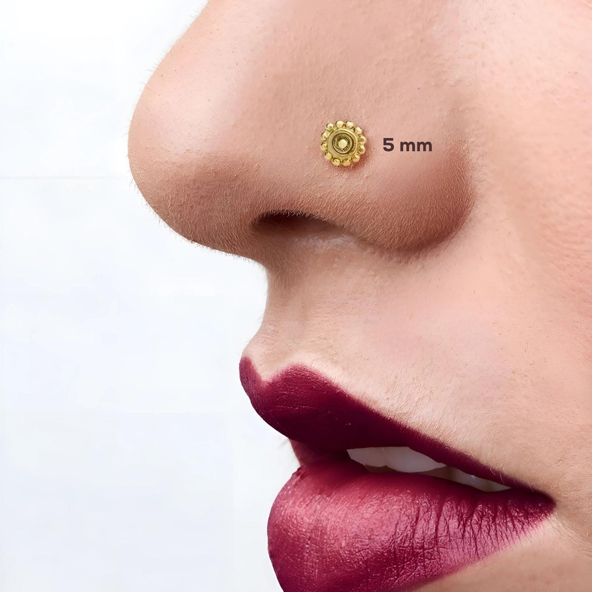 A close-up of a person's face, focusing on their nose and lips.