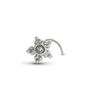 A silver-colored metal nose ring with a star-shaped design and small beads or stones.