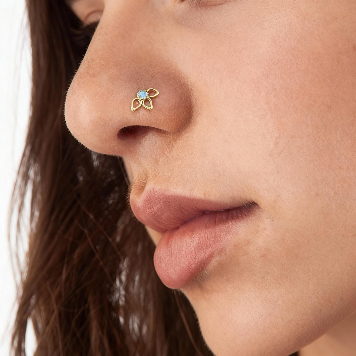 A close-up of a person's face, focusing on their nose and mouth area.