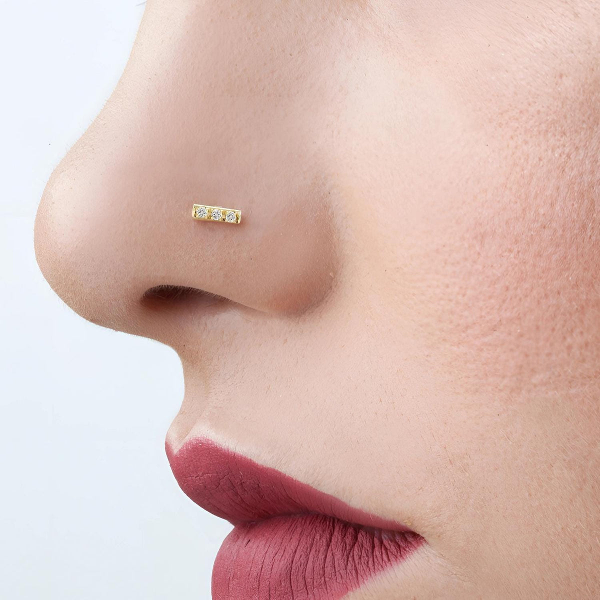 A close-up of a person's face, focusing on their nose and lips.