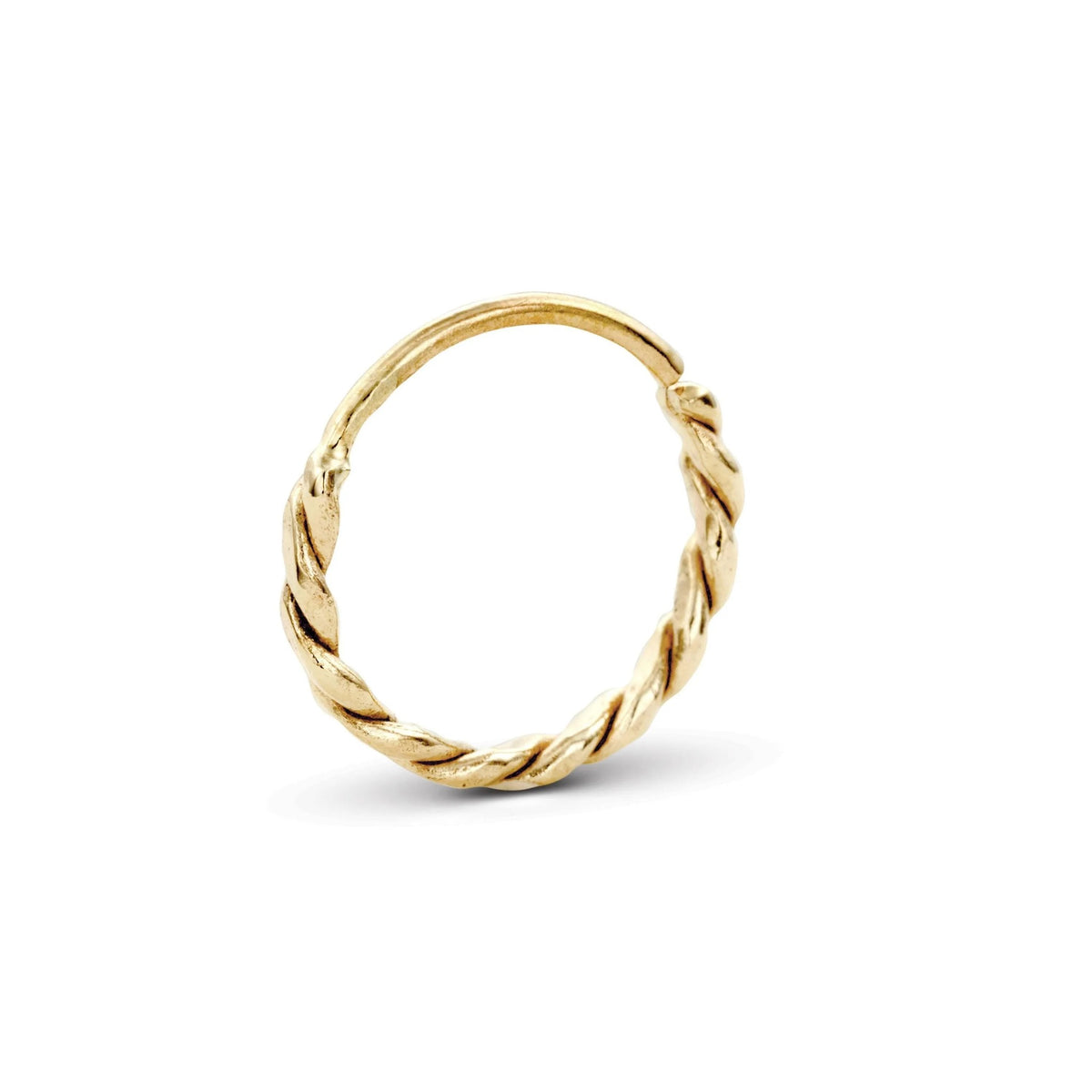 A gold-colored ring with a twisted, braided design.
