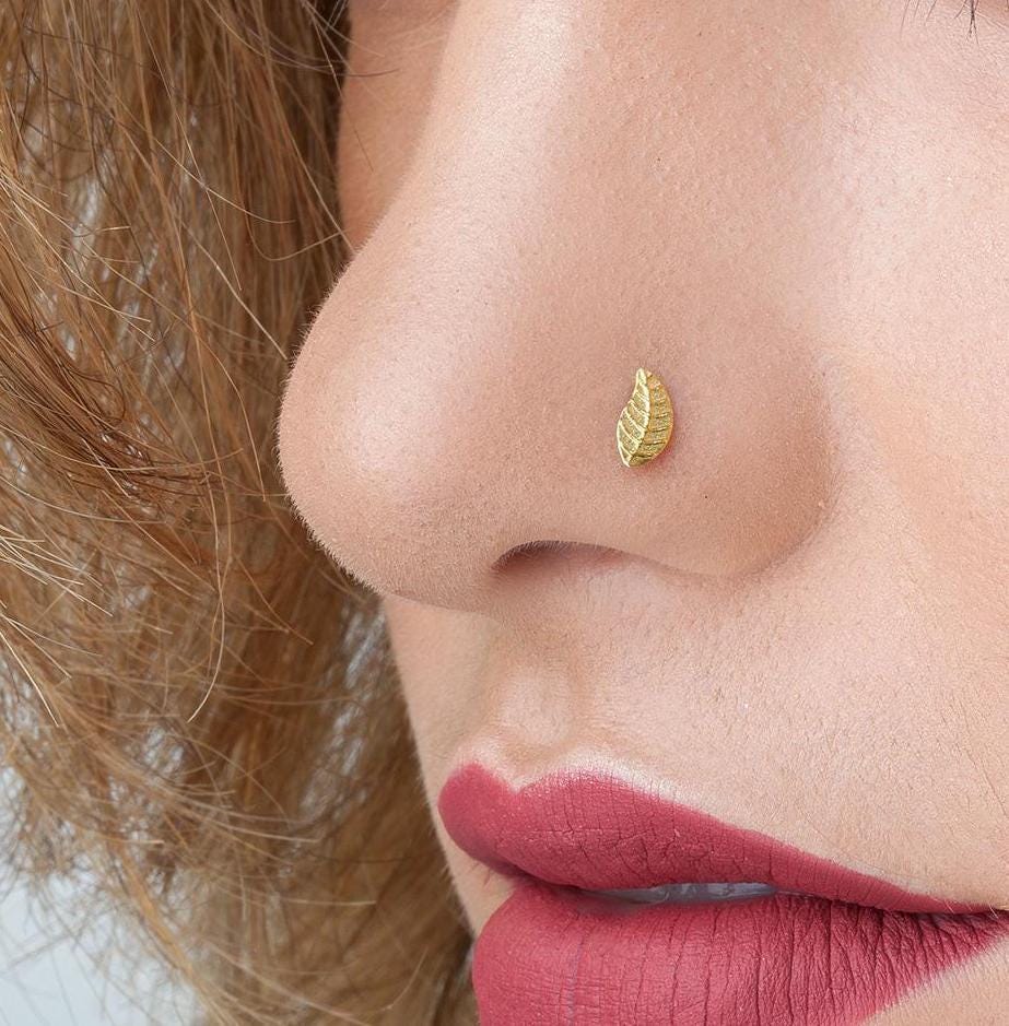A close-up of a person's face, focusing on their nose and lips.