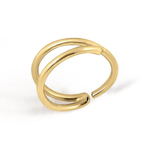 A gold-colored ring with a twisted, overlapping design.