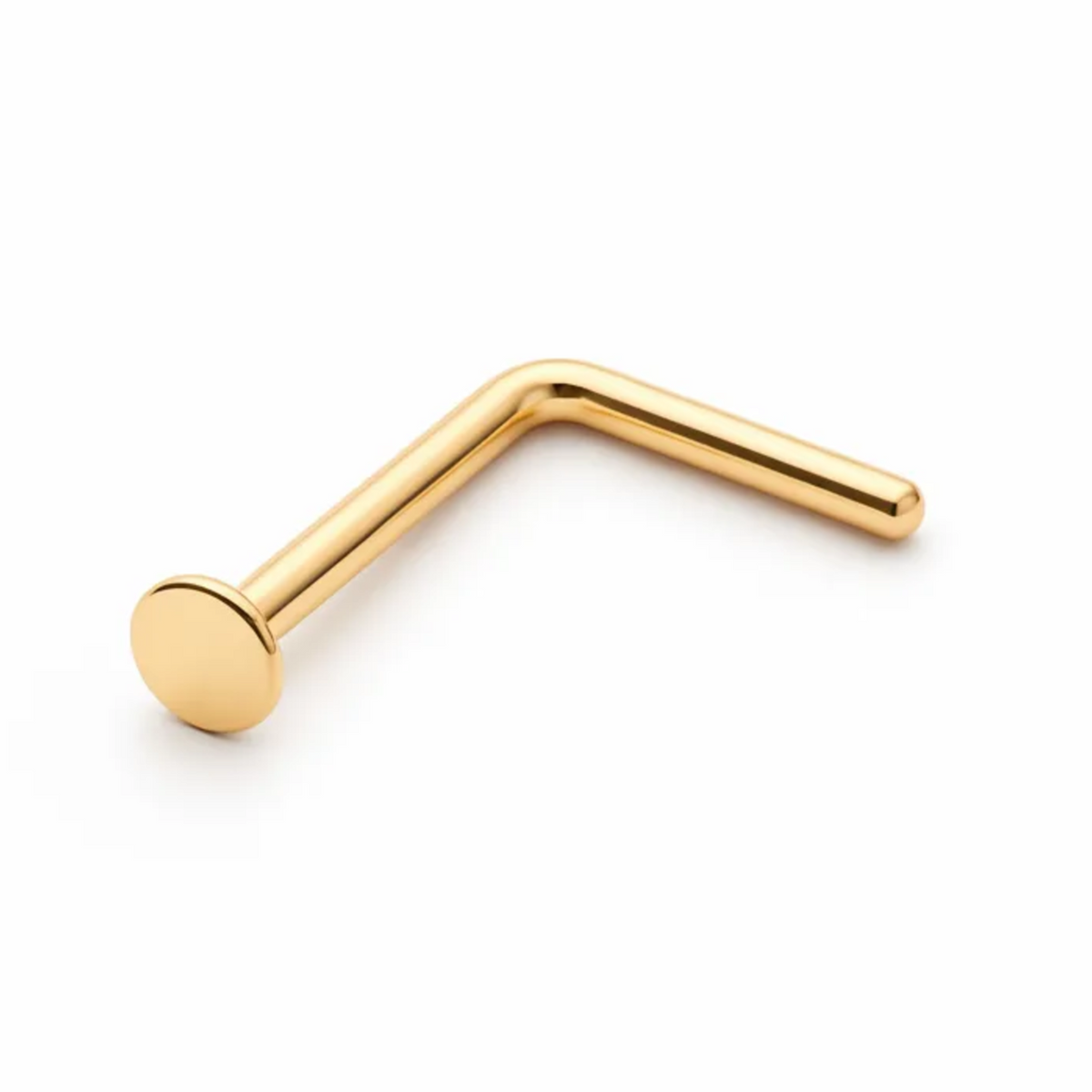 A single gold-colored metal nose ring is shown against a white background.