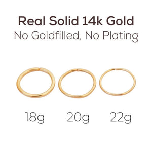 Gold nose hoop: three gold nose rings of different sizes, ranging from 18g to 22g in weight.