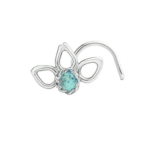 A silver nose ring with a blue gemstone in the center.