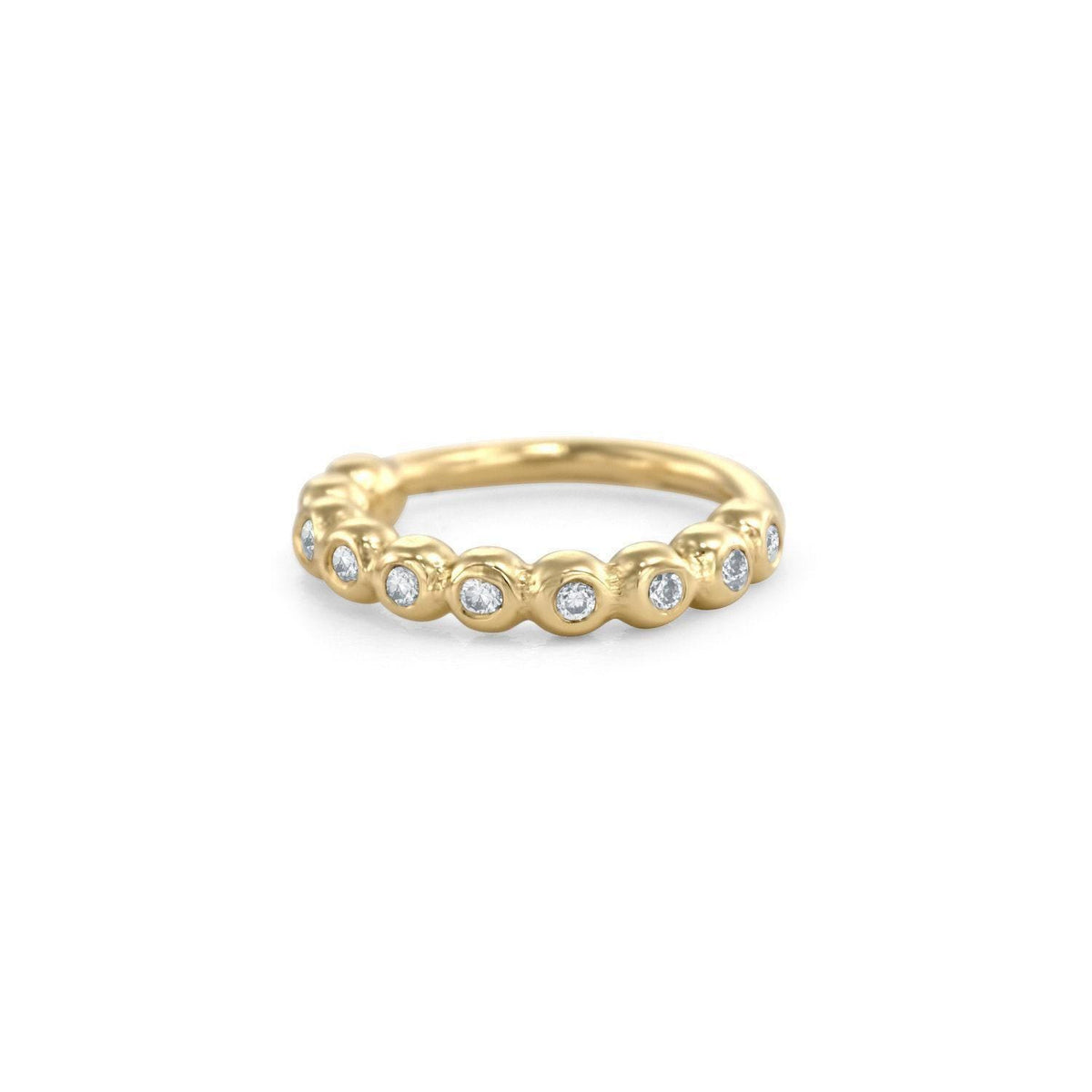 A gold ring with a row of small diamonds set in the center.