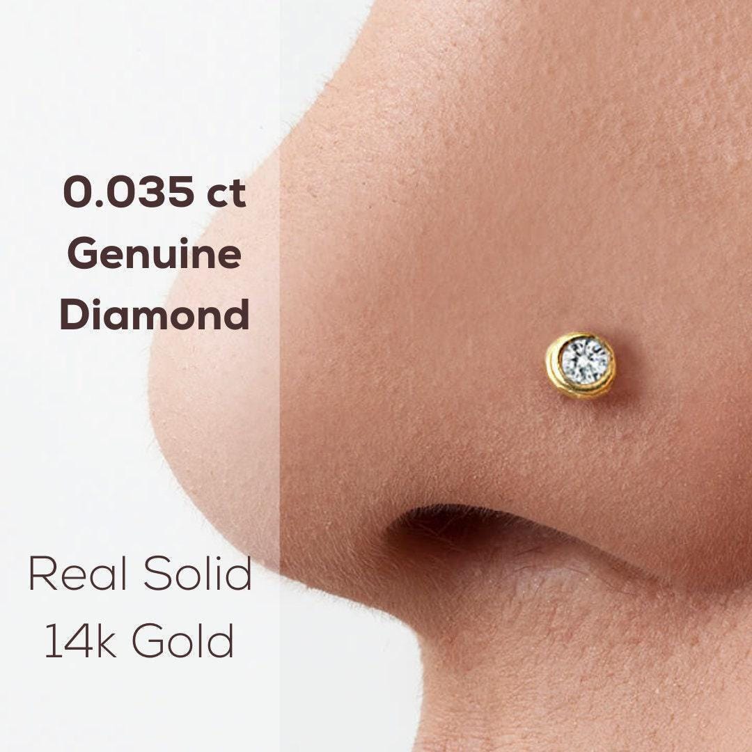 Diamond Nose Stud: a close-up of a person's nose with a genuine diamond nose ring.