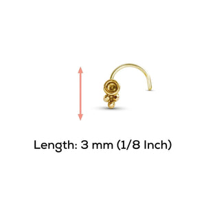 a gold-colored nose stud with a measurement scale indicating its length.