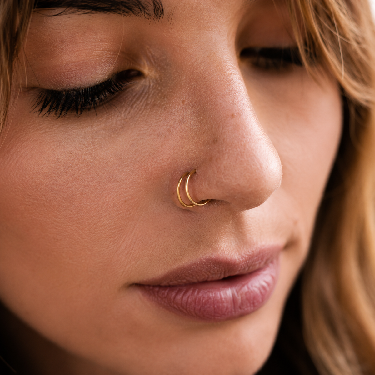 A close-up of a woman's face, focusing on her nose and lips.