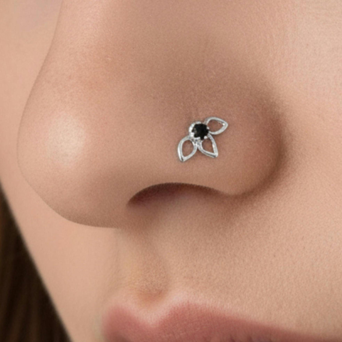 A close-up of a person's face, focusing on their nose and lips.
