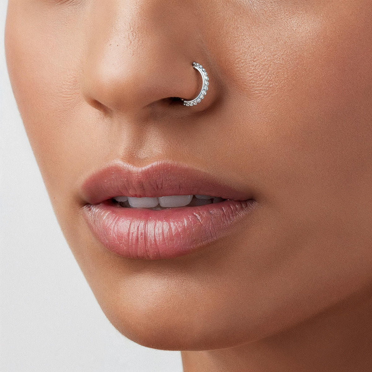 A close-up of a person's face, focusing on their lips and nose.