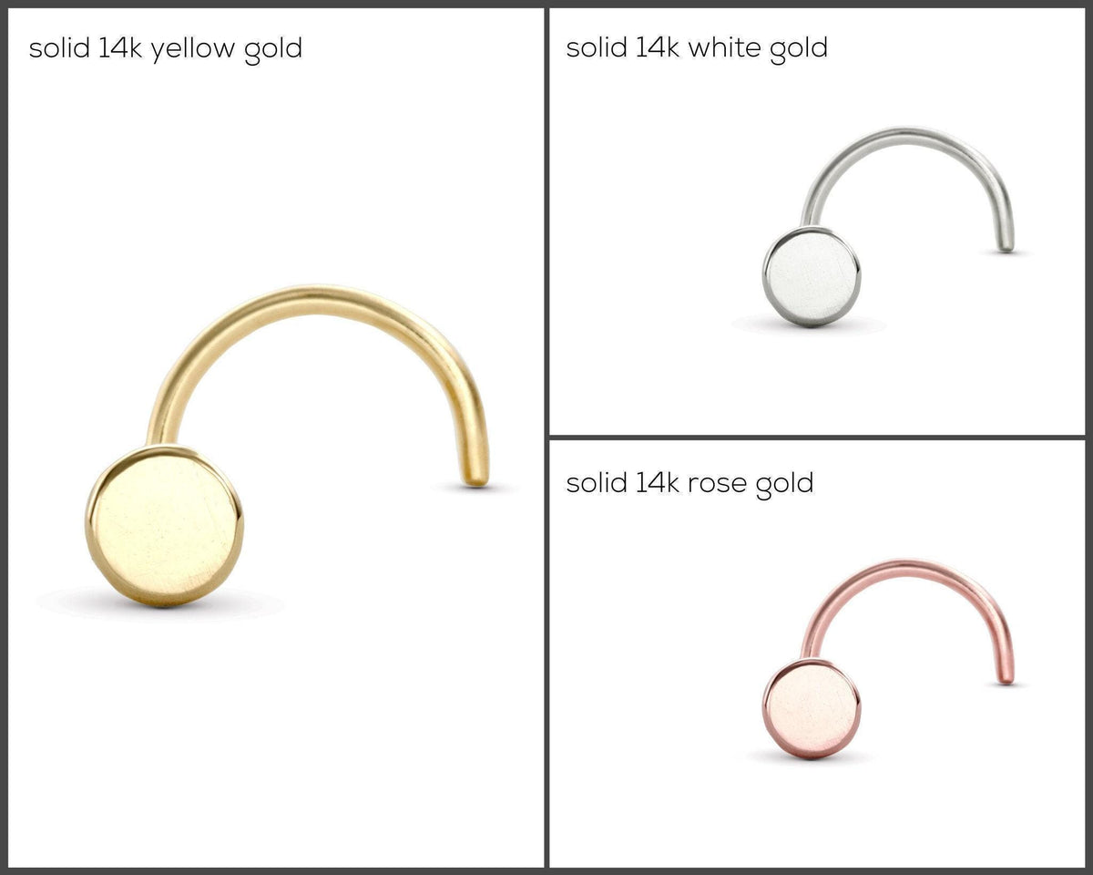 three different types of nose piercings, each with a distinct color and material. The first piercing is solid 14k yellow gold, the second is solid 14k white gold, and the third is solid 14k rose gold.