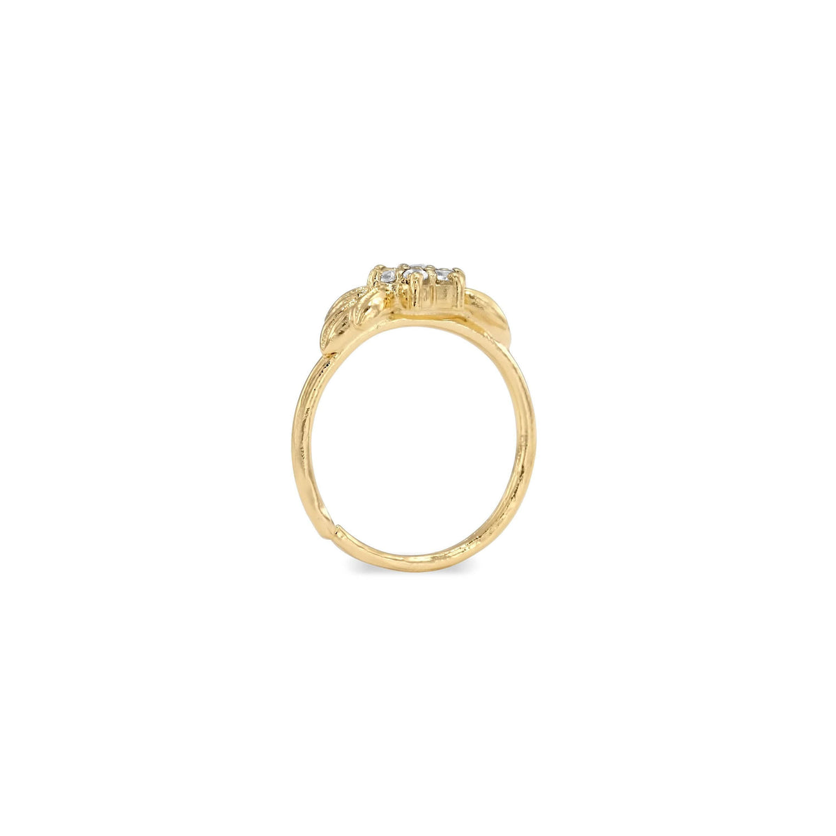 A gold ring with a floral design and a small gemstone in the center.