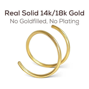 a pair of gold rings with a caption stating that they are real solid 14k/18k gold, without any fillers or plating.